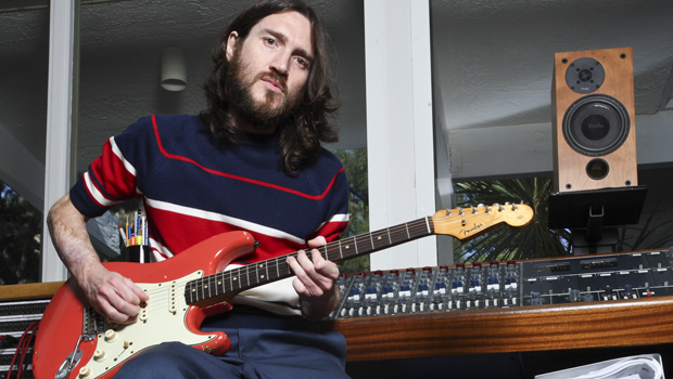 JOHN FRUSCIANTE AT HOME WITH GUITAR COLLECTION, 2008, RED HOT CHILI PEPPERS,.Photo Credit: NEIL ZLOZOWER/ATLASICONS.COM